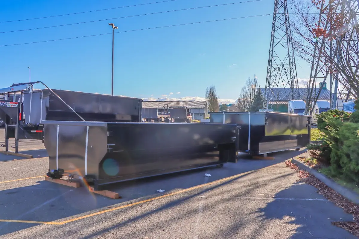 Roll-off dumpster ready for waste disposal at job site for Construction Dumpster Rental in Gonzales